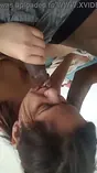 Indian crank with a grin slobbing on big black cock