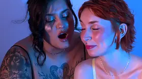 Watch this skinny redhead dominate and humiliate her food-loving lesbian partner in a dirty close-up of her belly and big tits