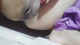 Priya69's warm solo sesh in a Bangladeshi village shower